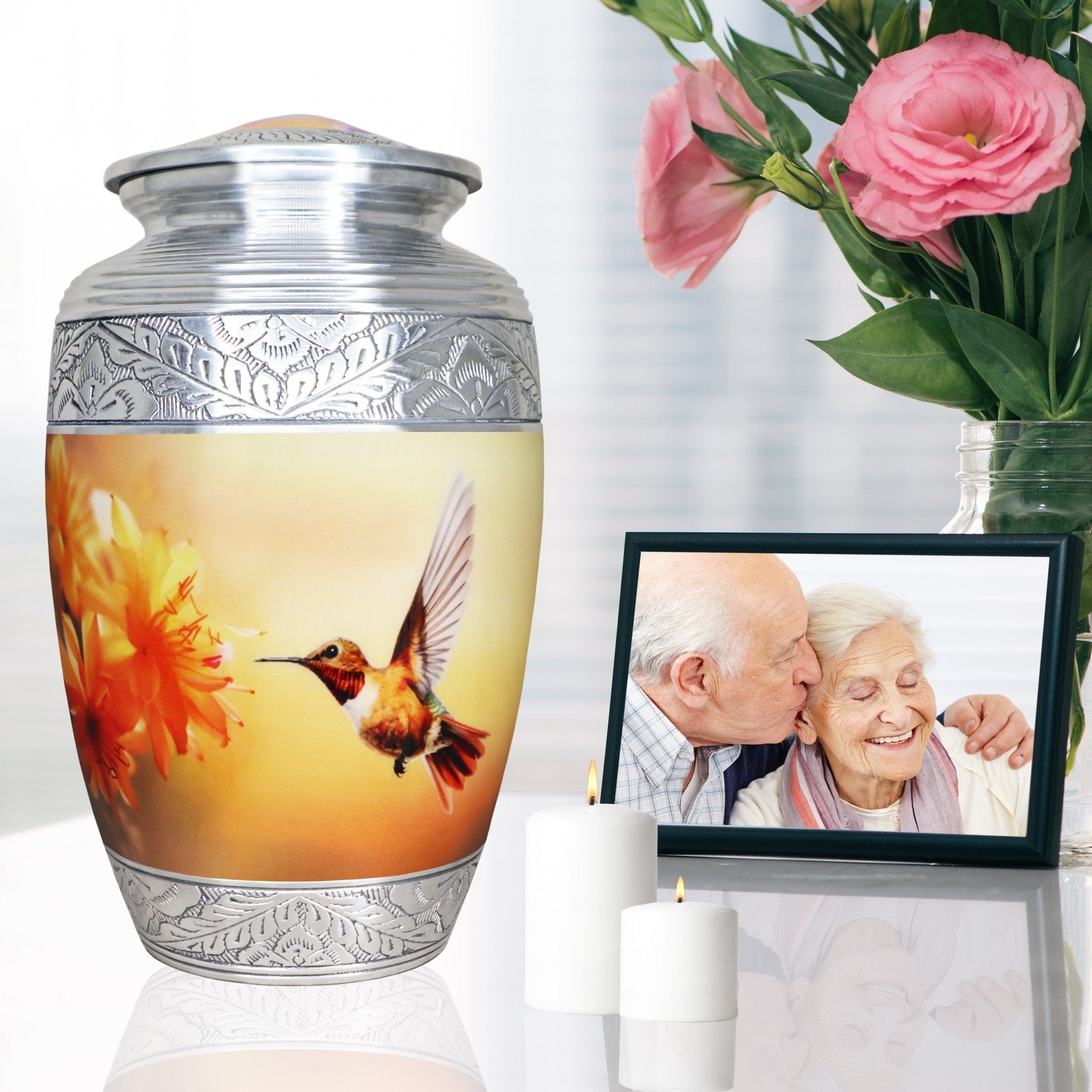 Elegant golden peach hummingbird metal funeral urn for ashes, intricate silver rim piece with blooms for mom and dad