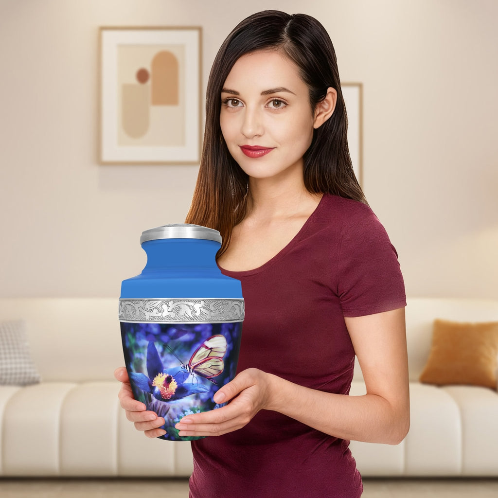 Funeral urn with blue butterflies and floral pattern, meaningful tribute preserving the memory of a loved one