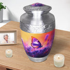 Metal vessel for crematorium use, purple flower butterfly adult urn styled with candles and framed photo