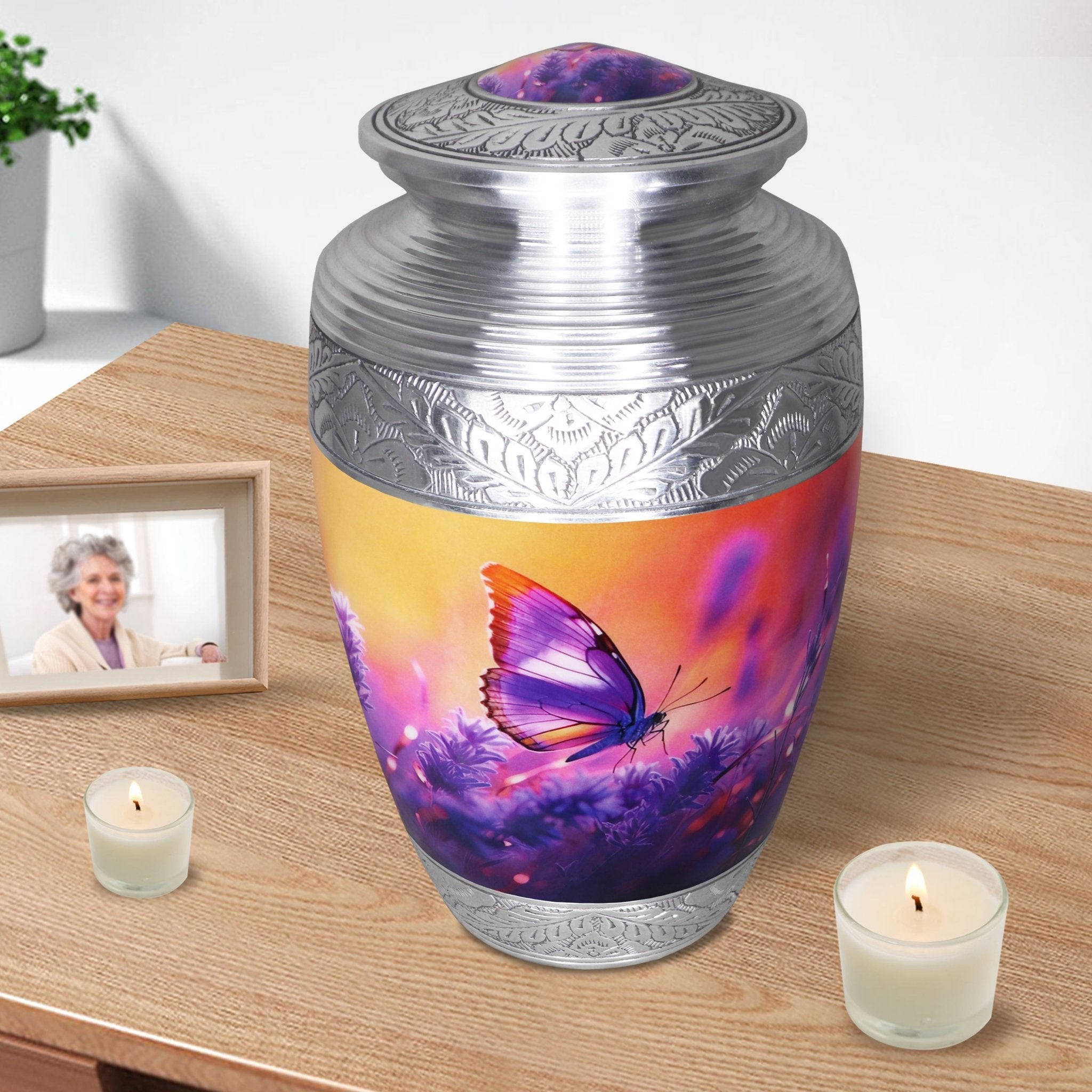 Metal vessel for crematorium use, purple flower butterfly adult urn styled with candles and framed photo
