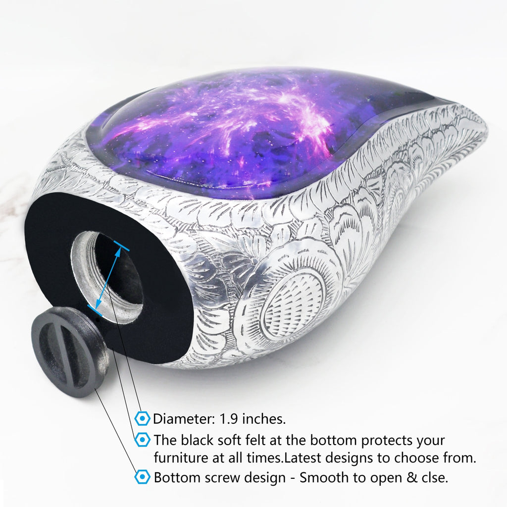 Aluminum tear drop urn with amethyst-inspired galaxy artwork and secure threaded bottom lid shown in detail
