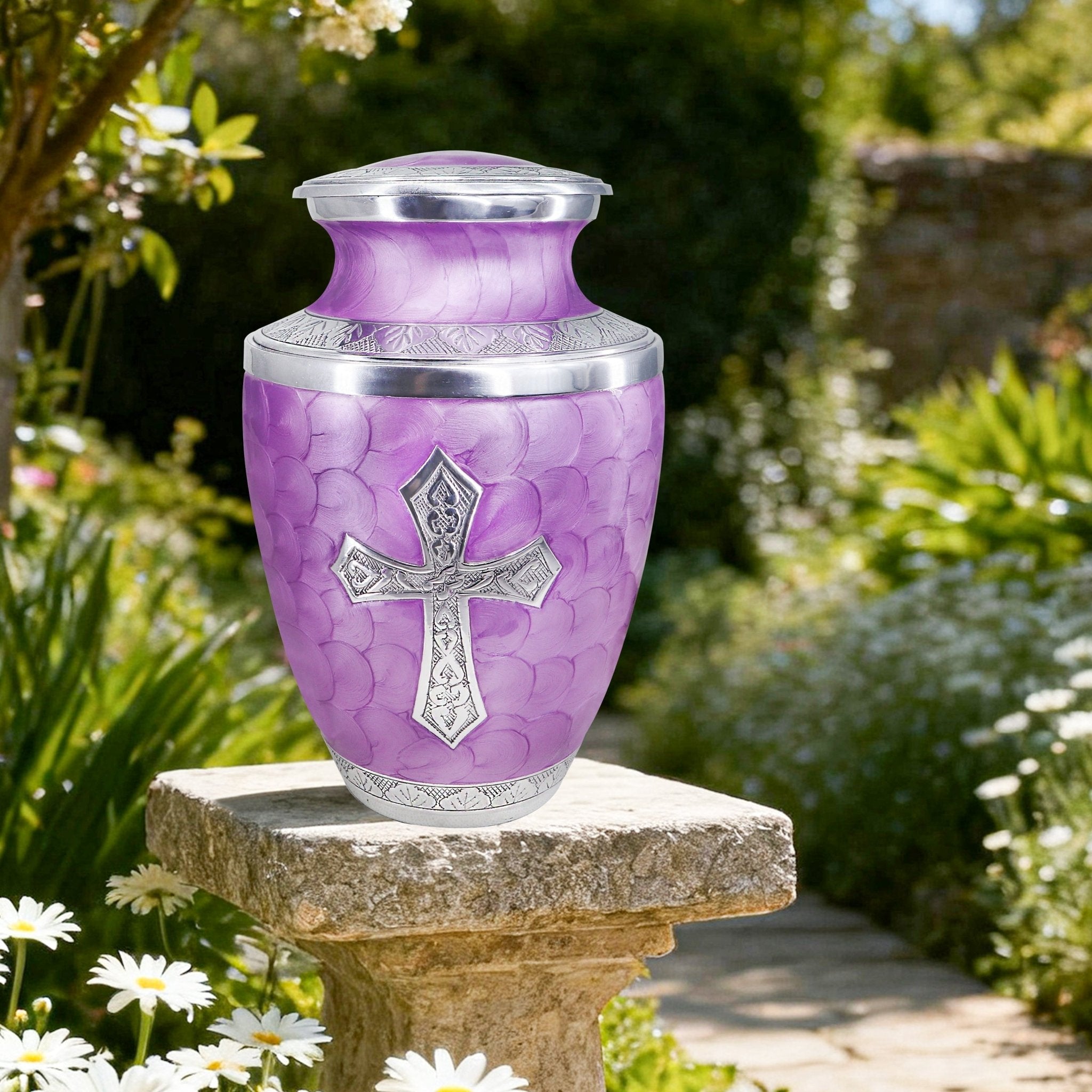 Urns for cremation ashes in a serene garden, engraved cross design honoring a loved one with timeless dignity