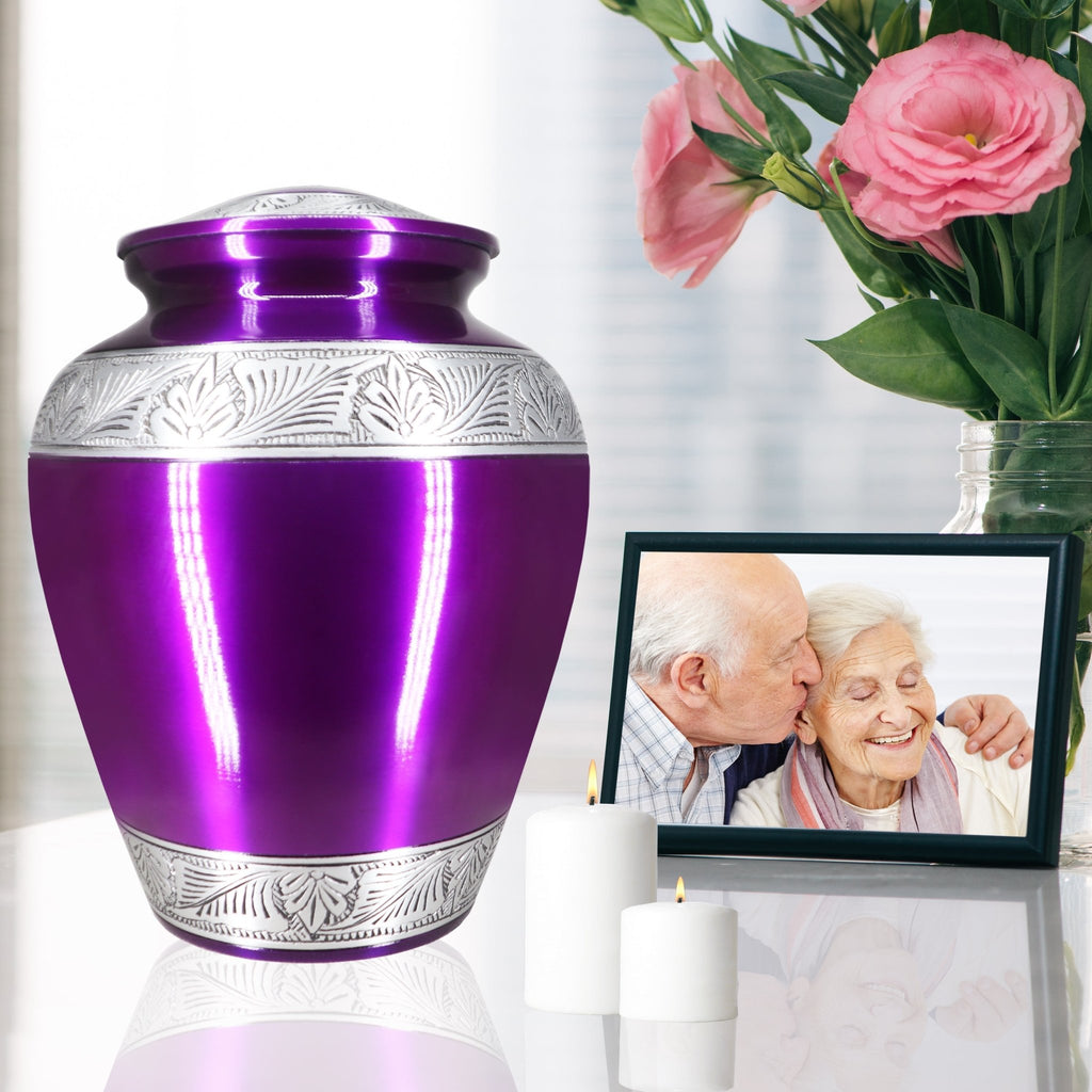 Lustrous violet engraved silver band purple funeral urn, heartfelt tribute honoring both mom and dad with floral decor