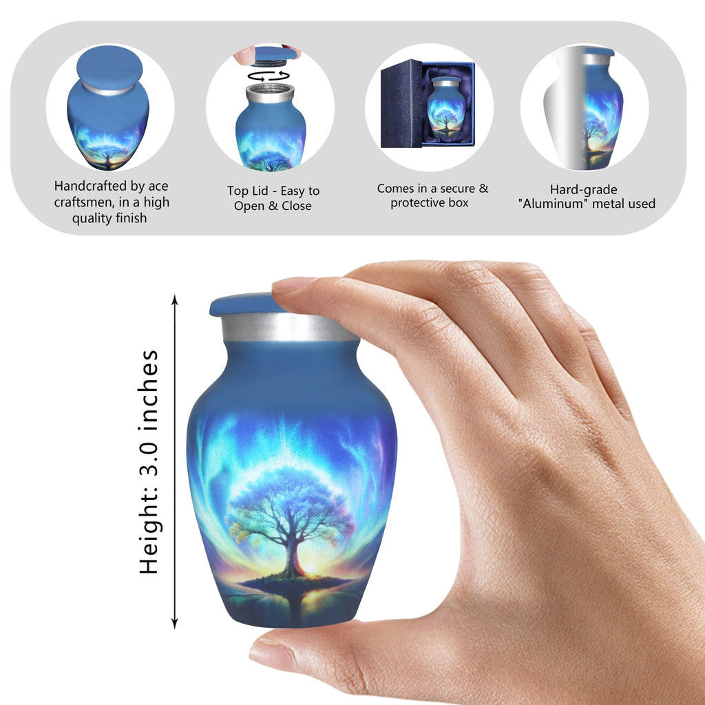 Small urns for human ashes, hand holding a mini urn with a blue galaxy Tree of Life for family remembrance