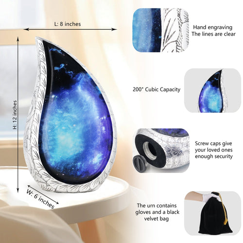 Blue-black galaxy teardrop urn with full-size markings, engraved silver trim, secure screw cap and black velvet storage pouch