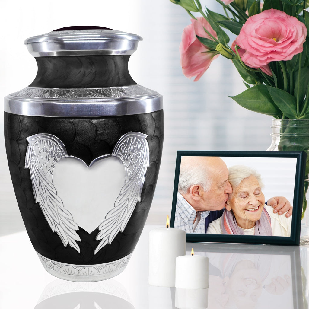 Elegant black etched angel & heart funeral urn honoring mother, decorative metal home memorial display