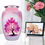Urns for cremated remains beside family photo and roses, graceful memorial for a cherished loved one