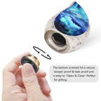 Rotatable threaded bottom lid demonstration for ocean print brass small urn, easy twist design to fill human memorial ashes