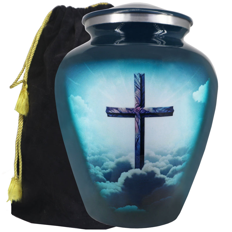 Turquoise cross urn for ashes with blue cloud artwork, adult aluminum memorial urn and black satin storage bag