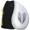 White angel wing urn for ashes with sculptural tear drop design, silver engraved wings and black velvet storage bag