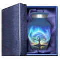 Keepsake urn for ashes with blue northern lights Tree of Life artwork presented in a padded gift box for family remembrance