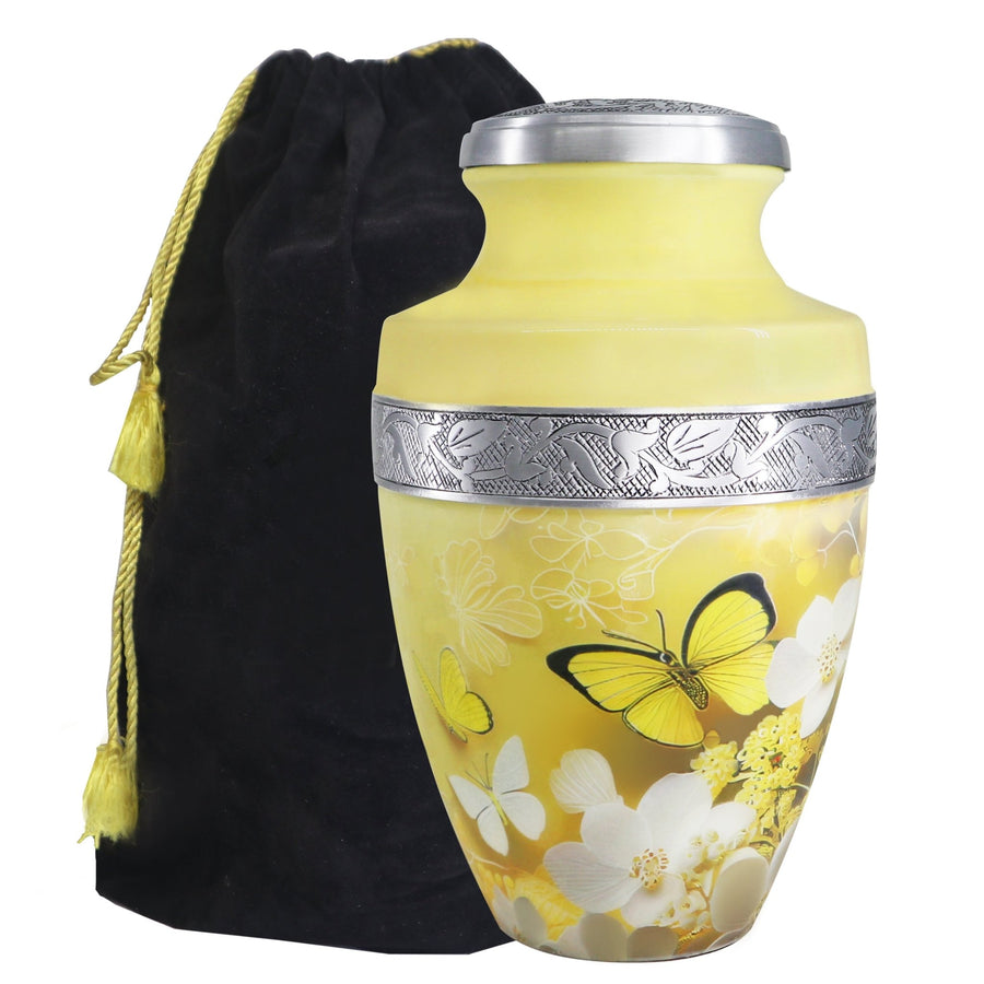 Yellow urn with butterfly and floral artwork, silver engraved band and black velvet storage bag