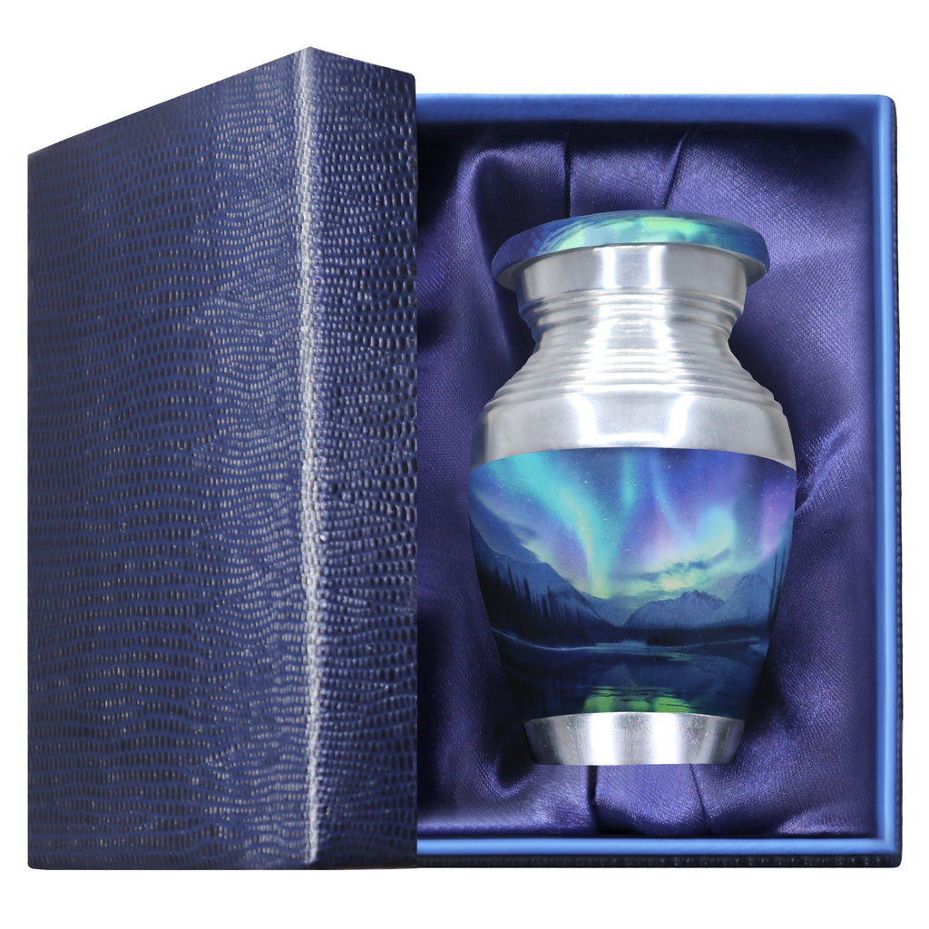 Mini keepsake urn for ashes with Aurora Borealis artwork presented in a padded blue memorial gift box