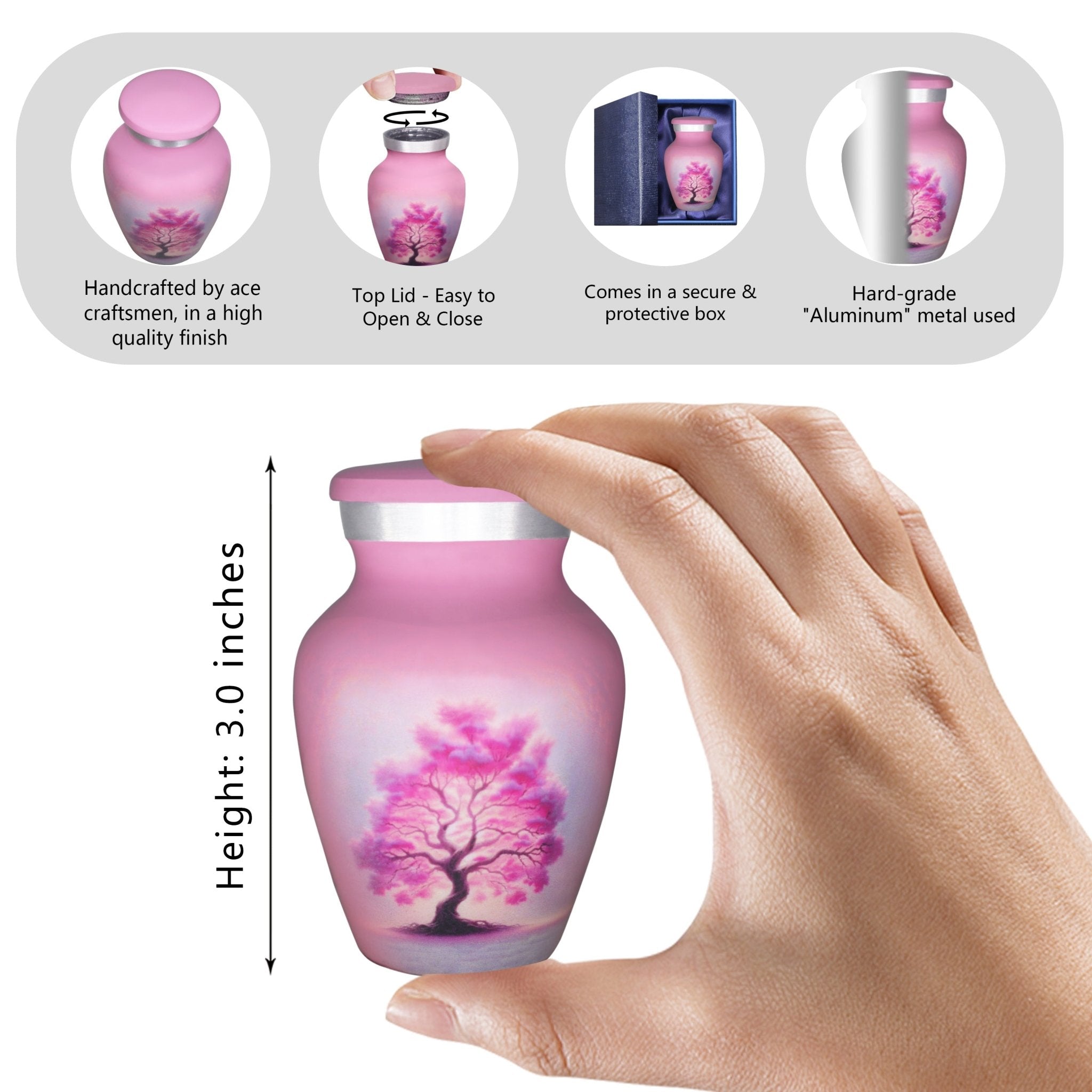 Hand holding a mini urn with a pink Tree of Life, small urns for human ashes sized for family remembrance