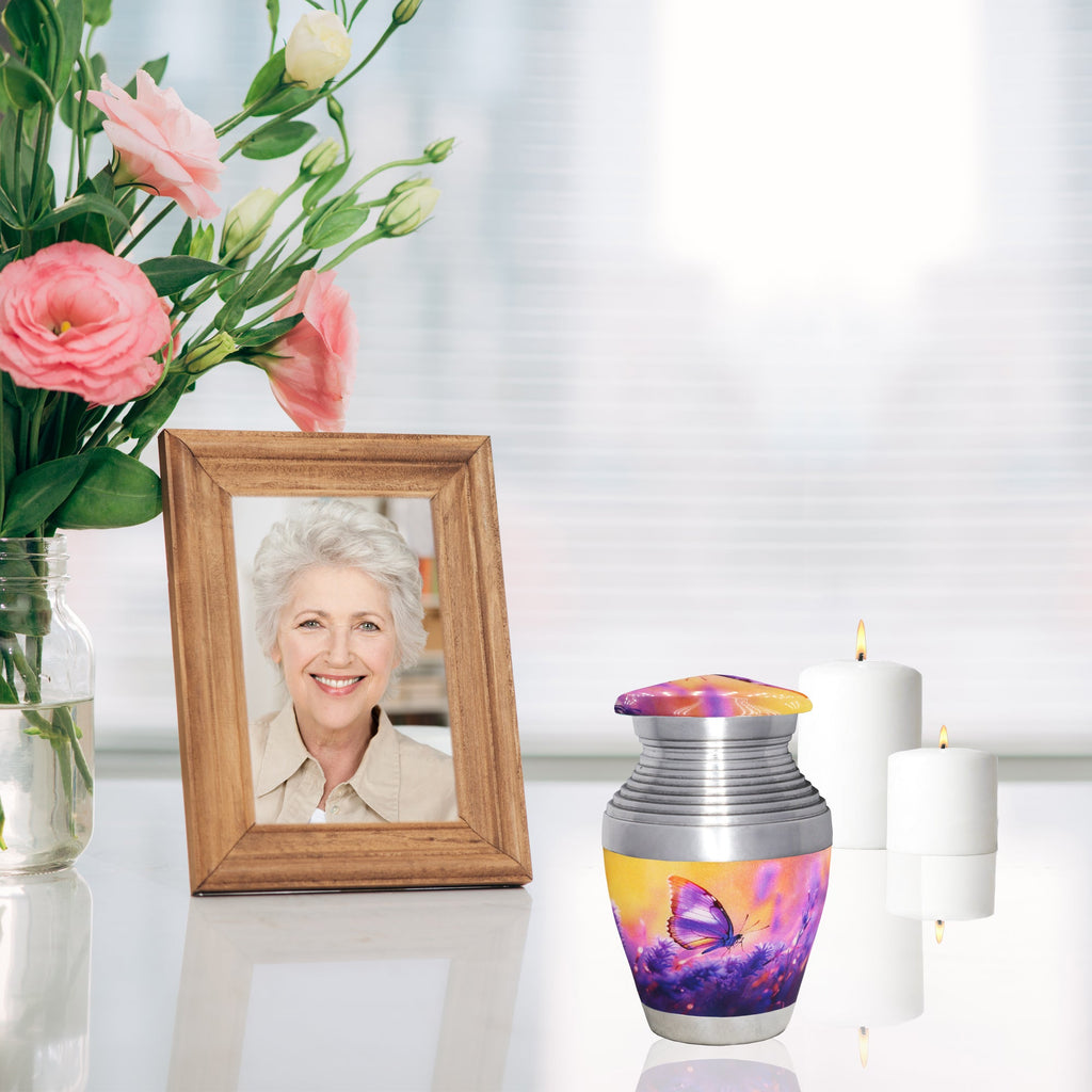 Cremation urns and purple lavender butterfly pattern, tiny memorial urn and screw lid, displayed with photo frame and candles