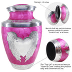 Close-up view of ashes in an urn for grandma, pink laser-etched angel & heart aluminum piece with airtight seal