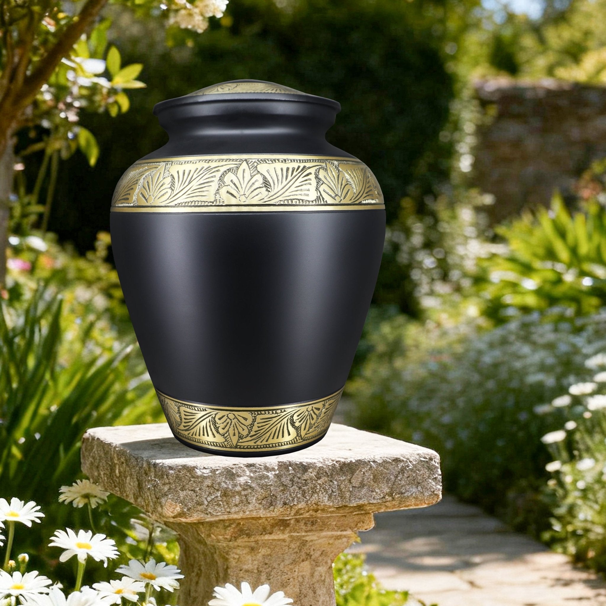Jet black engraved gold edging metal burial urns for ashes for adults, serene garden tribute for beloved dad on stone